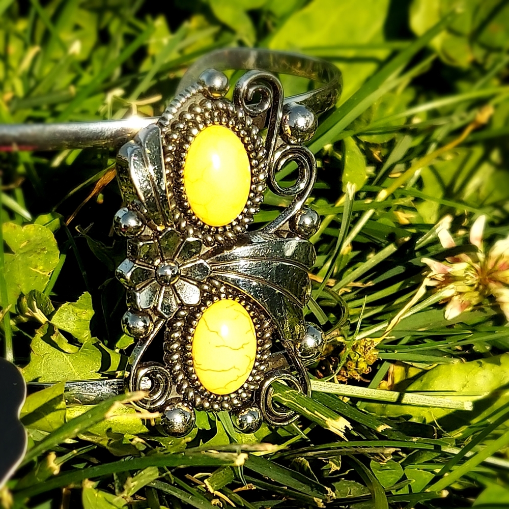 Yellow and silver scroll double cuff bracelet